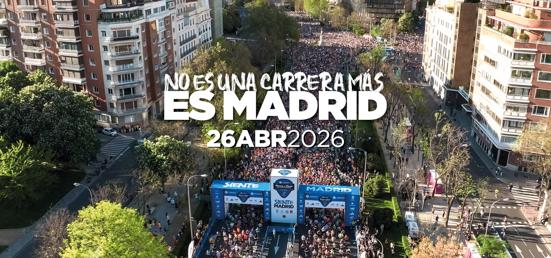 Runners at the Madrid Marathon start on Paseo de la Castellana